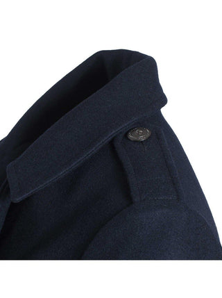 Close-up of a navy wool men's coat with shoulder epaulet and metal button detail