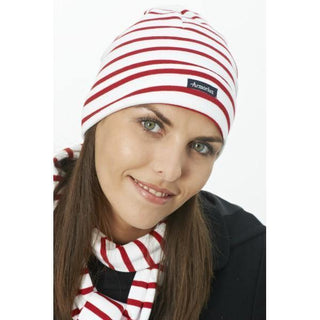 Woman wearing a red and white striped cotton beanie and matching scarf
