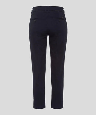 Back view of navy blue women's capri cotton satin pants with buttoned pockets