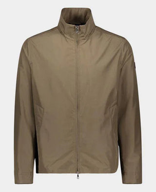 Men's beige nylon lightweight zip-up jacket with high collar on plain background